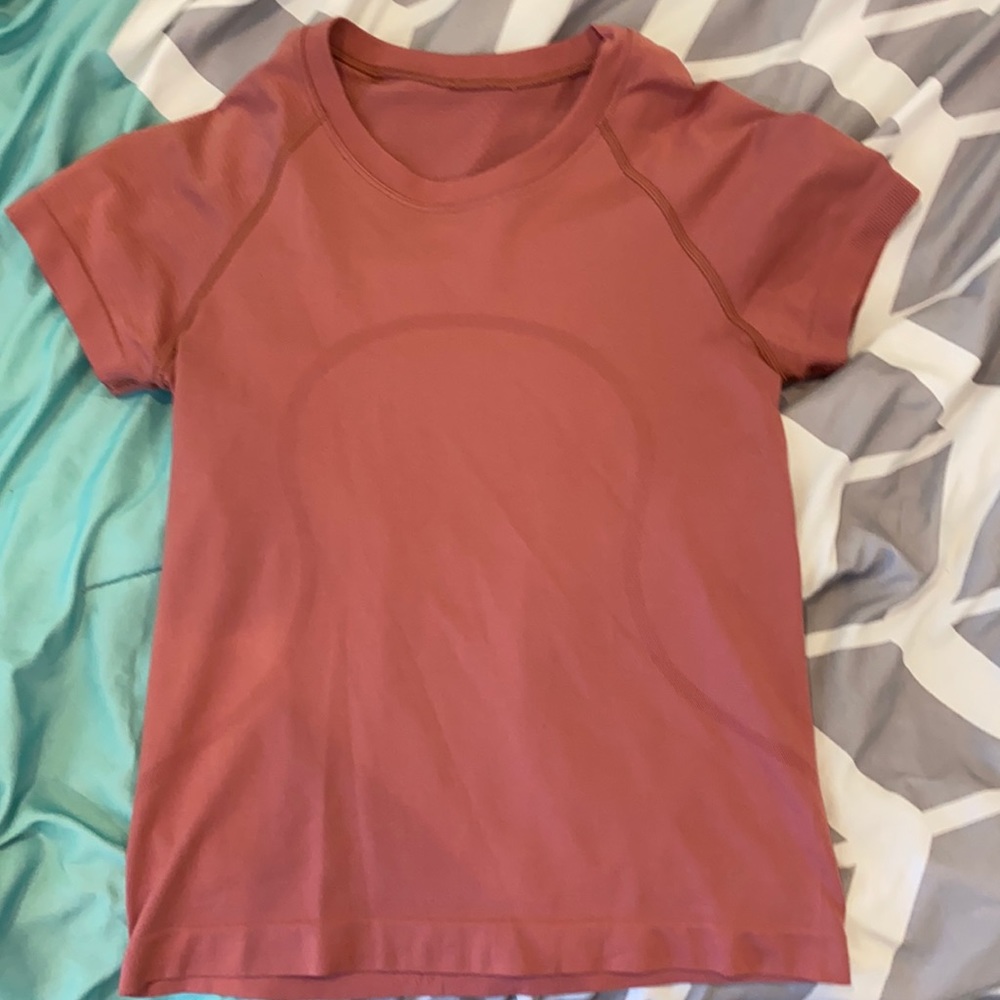 Lulu lemon size 2 swiftly tech lightly worn pink